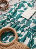 Tasha™ | Elegant Magkamouflerande Midiklänning